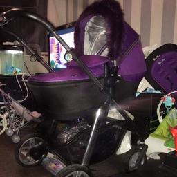 good condition comes with carseat, carrycot pushcahir part bag and black fur collection b29