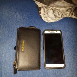 Ich biete hier ein Samsung S6 mit Schwarzer Tasche an . Das Handy ist Weiss . Ich hatte es gebraucht bei Ebay gekauft habe aber jetzt ein neueres Samsung gekauft. Da ich kein Gebrauch mehr dafür habe möchte ich es gerne Verkaufen , VB .