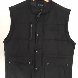 Beautiful Gilet - very comfortable and warm. 

From smoke and pet free home