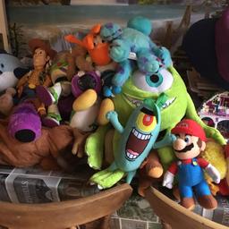 Job lot of lots of different cuddly toys from woody buzz lightyear angry birds Mario sponge bob yoshi