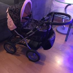 Dolls silver cross pram with shopping tray and bag, handles adjust to height you want it, it also folds down for storage