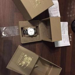 Like new imaculate Burberry watch 
100 percent authentic 
All boxes papers present 
Jus had new battery and resealed with guarantee for £29.95 (included)
Swap for anything try me 
Ask for my number for more pics thanks