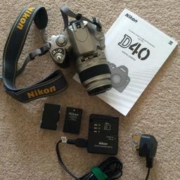 Nikon D40 silver colour
Limited edition
digital SLR camera
DX 18 x 55mm lens
battery charger and 2 batteries

Nikon carry strap and instruction manual
6.1 megapixels, 2.5 inch LCD

Its had little use as progressed to higher model therefore very good condition