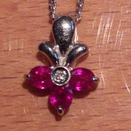 18ct Ruby and diamond pendant and chain
approx 16inch
5grams in weight