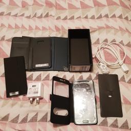 Samsung galaxy s7 32gb in great condition still with original screen protector on and been in case since day one. comes with new headphones, original charger, and 2 cases