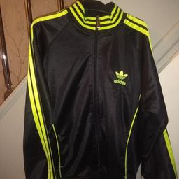Girls/ladies fitted track jacket size 6/8 (says 8 on label but small fit) Neon yellow Adidas stripes down arms/collar and waist band. large Adidas logo on back of the jacket as well. Good condition, collection from Knuzden Blackburn £5