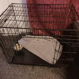 For sale is this dog crate in as new condition.
Two door opening and collapsible for transport.
Includes bowl that attaches for food or water
75cm long 63cm height 60cm wide