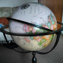 great globe on a metal stand.  look good in any home.

collection only