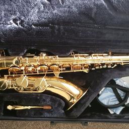 Yamaha tenor saxophone YTS-280 like new with carry case, spare reeds, mouth piece, neck strap and full instructional set for learners including CD and reading materials