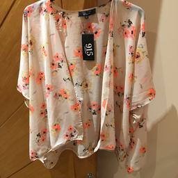 Size large new look girls kimono. Brand new with label on.