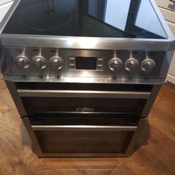 In VERY good clean working condition, see photos
Top oven/Grill,  main fan oven, ceramic hob, clock/timer