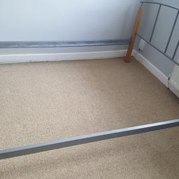 Metal bed frame size double, wooden slates are included but one is broken. I have taped it up while it was in use but could do with that one replacing. It's is all dismantled ready to go. Collection only please.