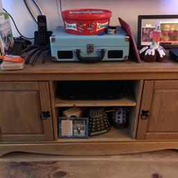 Could be used as a sideboard or tv bench as seen

Rustic finish could be varnished

Needs two people to move so buyer to collect please

Middle shelf supports need replacing (pegs) also has two large storage cupboards