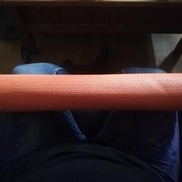 run if the mill orange yoga mat.  never used and taking up space.