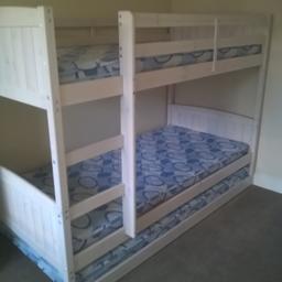 Bunk bed which consists of 3 x single beds with the 3rd being a pull out which can be moved anywhere.