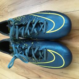 Size 9 Nike Football Boots in good condition.