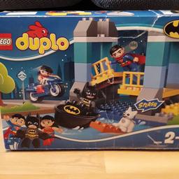 Lego duplo batman set includes wonder women and superman! 
All parts are present and correct! Box is a bit damaged (see pic ) doesn't affect play/parts 
All parts are in excellent condition from pet and smoke free home.