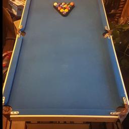 4FT 7" X 2FT 6". FOLD AWAY POOL TABLE 
4 X CUES.3 SETS OF POOL BALLS .2 TRIANGLES. CAN DELIVER LOCALLY.