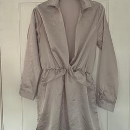Light grey pretty little thing dress in size 8, silk material, very comfortable to wear, only worn once. Comes from a pet and smoke free home, can deliver if local or can post for extra charge.