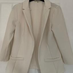 White blazer in size 10, only worn a couple of times. Comes from a pet and smoke free home.