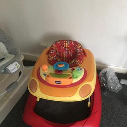 colourful baby walker has been used but not very often. plays music also, collection only burnt oak.