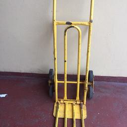 Heavy duty trolley. Please note the bar on the left hand side is broken but trolley still solid as a rock turns well