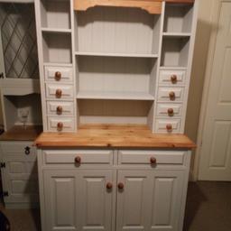 Lovely Solid Pine Dresser with Spice Drawers.

Newly refurbished in subtle grey.

Approx measurements Height 191cm Width 114cm Depth 48cm.