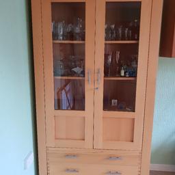 In excellent condition. Has 2 glass doors lockable. 2 drawers
measurements are :
width 41.5 inches
depth 17.5 inches
Height 77 inches