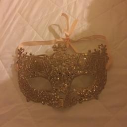 Gold Glitter Mascaraed Mask. Perfect condition. Comes from a smoke and pet free home