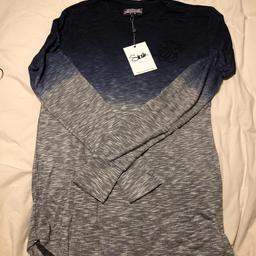 Brand new never worn men’s medium Siksilk top. Graduated colour from blue at top to grey at bottom.
