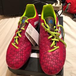 Brand new in box Adidas Predator boys football boots size 6.5. Never used. Smoke and pet free home.