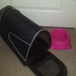 Small dog carrier 7kg max and dog bowl.
New with tags.