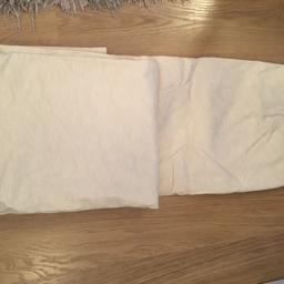 NEXT cream, fully lined curtains. Each curtain 7ft drop 5ft 8 width. Quite heavy and give excellent coverage. Great condition except one tiny mark on one. Dry cleaned and from non smoking household. Delicate pattern on them and look beautiful hung. Only selling as changed colour scheme. Picture does not do them justice.