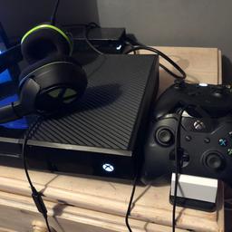 Xbox one , two controllers , charging port , turtle beech headset an games shown in the picture .. no box for the console  may swap for a PS4