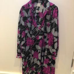 Silky vneck dress, could be worn as a dress, night dress or beach cover up. Splits a the side. Label says small 10-12 but could fit a 14 too as it quite floaty. Not sure what it’s made of, could be nylon, polyester or silk mix. Label doesn’t say. Machine washable.