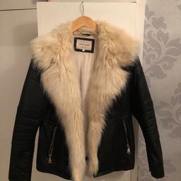 River island 
Fur leather jacket 
Ladies size 14
Brand new without tags