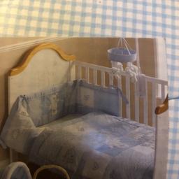 Brand new blue baby bedding for crib. Price as new £39.99 - only used in swinging crib for dressing  but never slept in.
Also comes with dimple bedding set.
Both items no longer needed