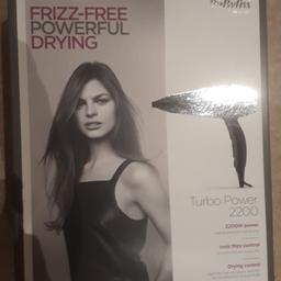 Unused/unopened hairdryer in original packaging.

FRIZZ-FREE POWERFUL DRYING TURBO 2200W POWER
HIGH POWERED FOR FAST DRYING

Collection only please