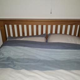 Pine double bed frame with mattress if wanted.In good condition,ideal for storing stuff underneath.