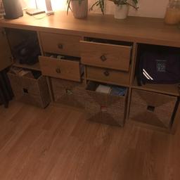 Oak effect storage unit. Four drawers, two cupboards, four baskets. Doors and drawers can be removed / moved. 146.5 cm long. 39cm wise. 76cm high. Good condition. Pet / smoke free home.