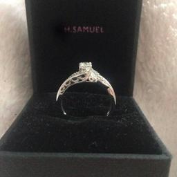 H.Samuel's, 9 Ct gold, 0.25 carat diamond, k size diamond ring. Hardly worn (nearly unused), Immaculate condition. Having baby it doesn't fit anymore.
Collection only