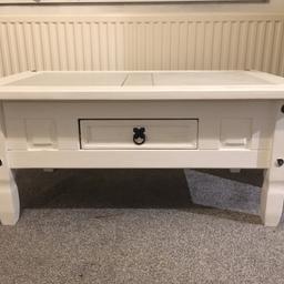 Solid wood coffee table painted in chalk paint with the option to transform it into a shabby chic look.
