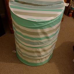 Washing basket, striped and lightweight.