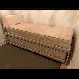 Single bed with trundle bed underneath. In excellent condition, hardly used. Both bed with single mattresses. Great for guests and sleepovers. Cost new £350. Selling due to downsizing. Bed dimension when closed 198cm x 89 cm.