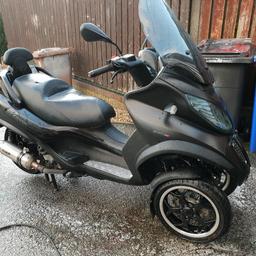 piaggio mp3 500ie touring sport Lt can ride on car licence full mot just hade survice by piaggio mane dealer done 17000km about 12000miles mint condition all the extra heated grips oxford all new tyers sports exhaust led lights and uprated lights had the steering bearing check and all good has hade the grease done to the bearing bike rides very well and is very fast it's got the better alloy black and silver new battery And starter relay all ready for summer £3500 ono
