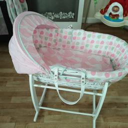 pink Moses basket in good condition hardly used as baby slept in carry cot of pram and had a next to me crib