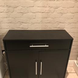 Black cabinet with silver handles, Ideal for storage. With large pull out draw. Measures approx 12 inch depth, 32 inch wide and 29inch height. Good condition, Collection only.