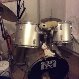 Good used condition. Perfect for beginners. 
A set of drumsticks included and stool. Symbol and high hat included.

Collection only from Arundel