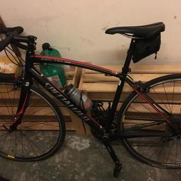 Specialized Secteur Road Bike, ridden less than 5 times. Excellent condition. Amazing value.