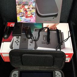 Nintendo Switch in Grey with Mario Kart Delux and Hard Carry Case. I've Not had it long thought I would use it but I've literally used it twice since I've had it. I paid £350.

COLLECTION ONLY!!! NO DELIVERY!!!